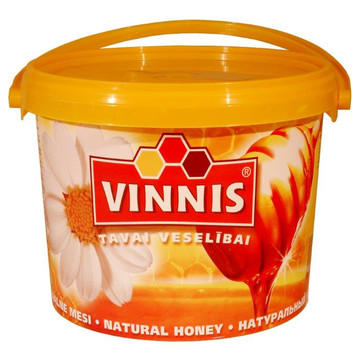 HONEY OF VARIOUS BLOSSOMS IN A BUCKET